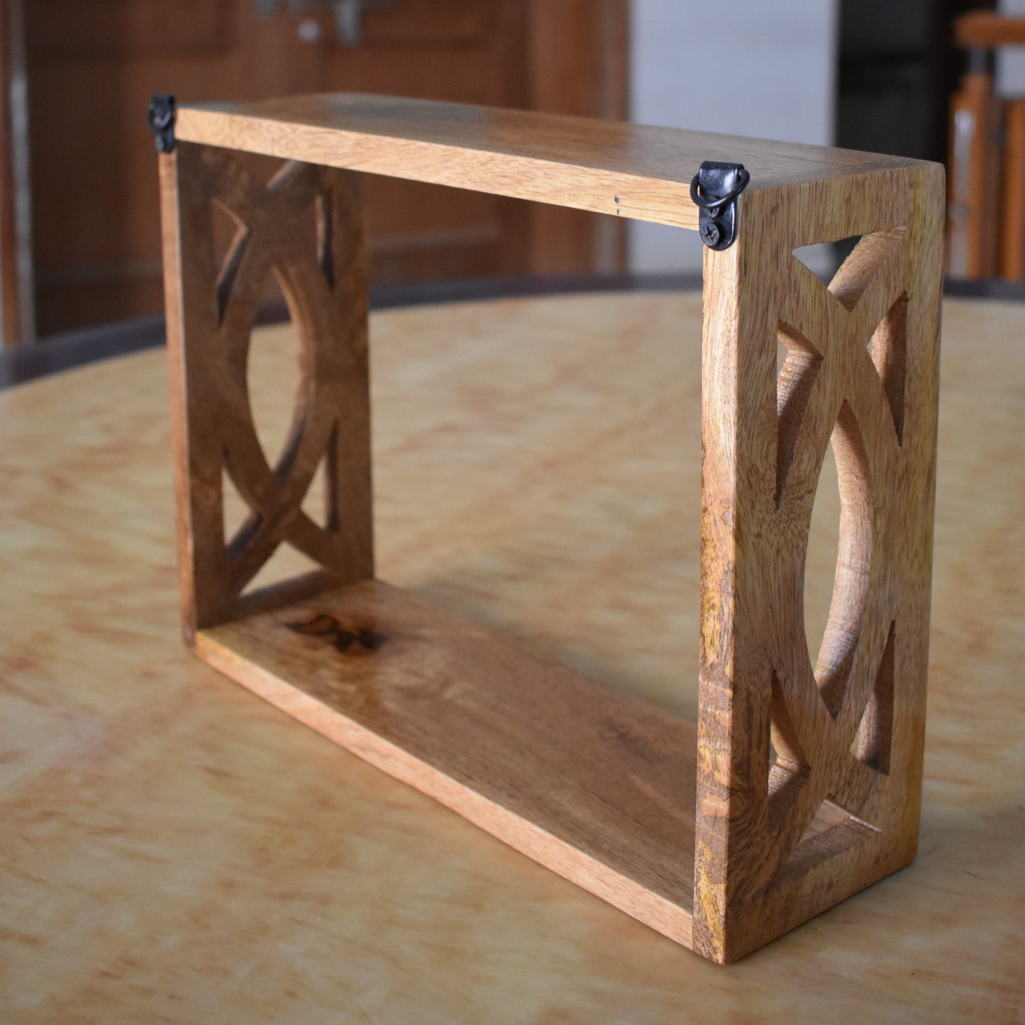 Handcrafted Wooden Wall Shelf with Intricate Cutout Design