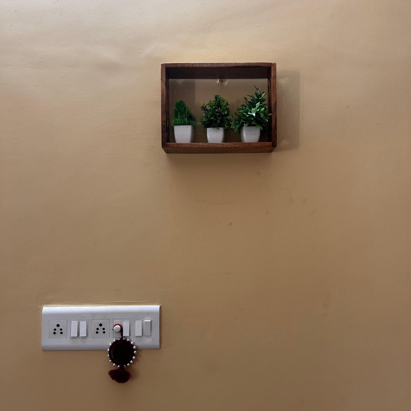 Handcrafted Wooden Wall Shelf with Intricate Cutout Design