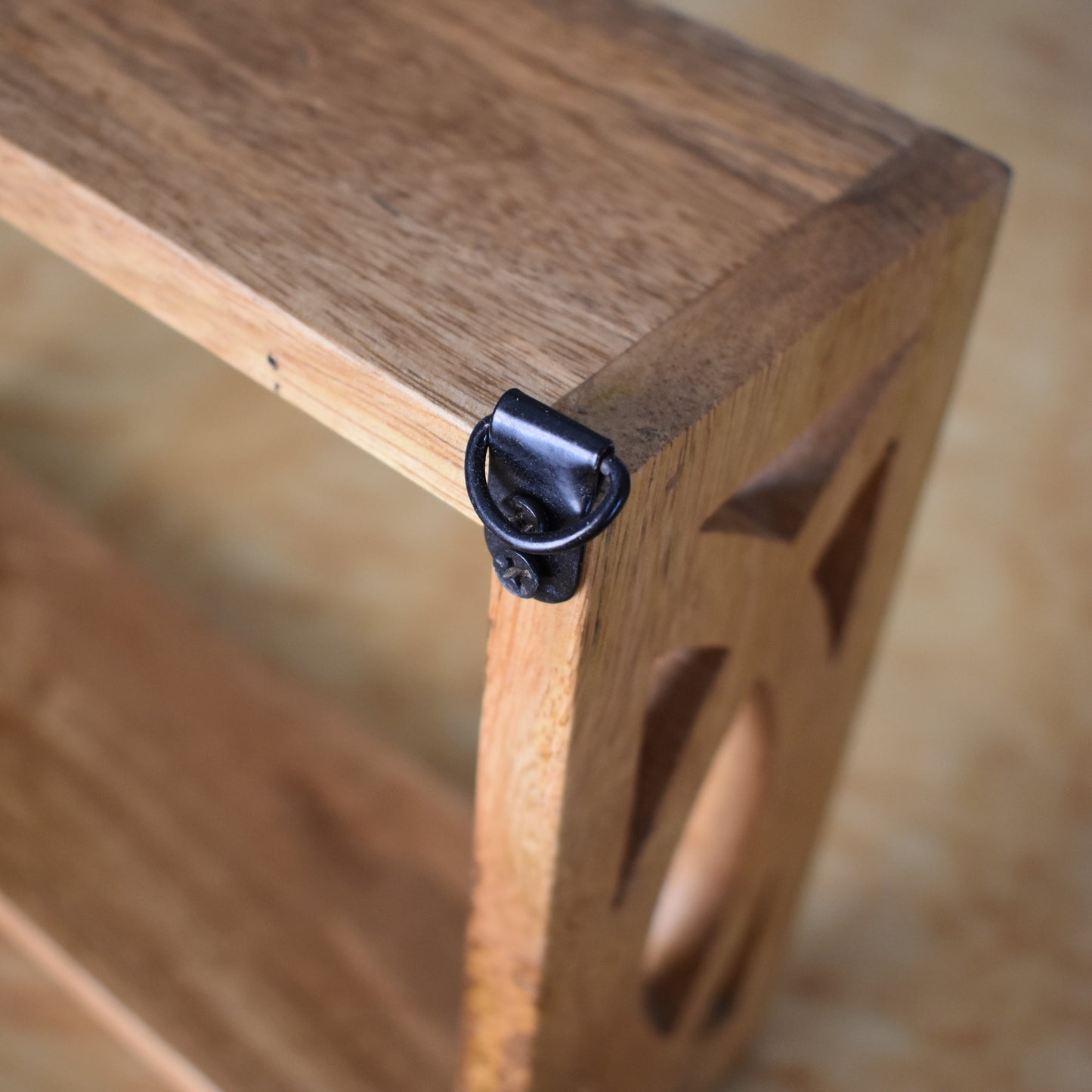 Handcrafted Wooden Wall Shelf with Intricate Cutout Design
